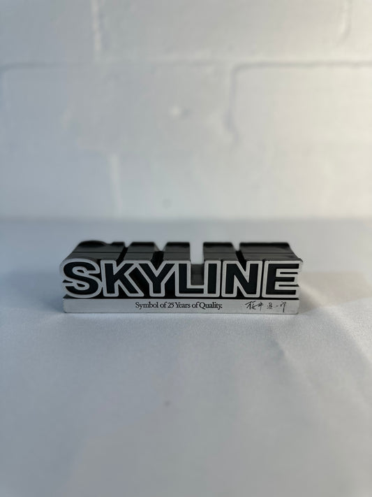 Skyline 25th Anniversary paperweight